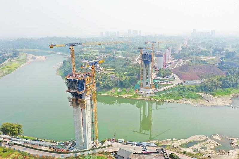 3月13日拍摄的渝昆高铁泸州沱江特大桥施工现场。 张富荣 摄.jpg